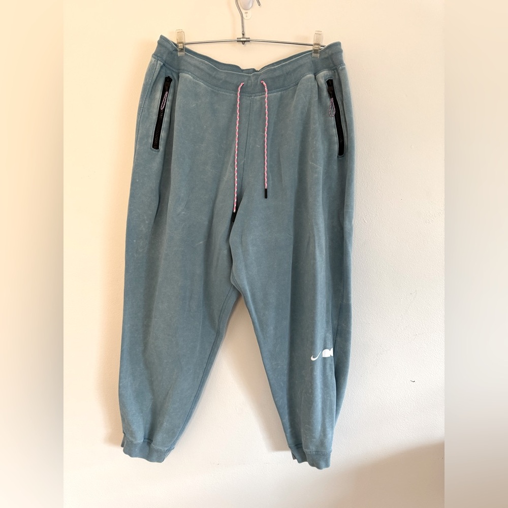 Nike loose fit joggers. Teal, zip pockets, size XL